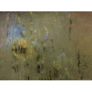 Condensation on a Window Pane Abstracts Outside Autumn Foliage Colors 