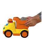FISHER PRICE DUMP TRUCK 2 LITTLE PEOPLE AND 4 ROCKS  