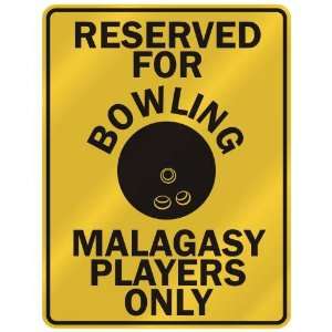 RESERVED FOR  B OWLING MALAGASY PLAYERS ONLY  PARKING SIGN COUNTRY 