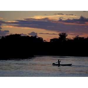  Boaters on  River at Sunset,  River Basin 