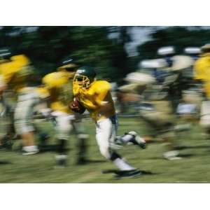  High School Football Player Carrying the Ball Photographic 