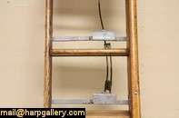 signed Putnam Rolling Ladder, NY, could be used in a tall library 