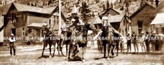 PHOTO OF EARLY 1900S COWBOYS PLAYING COWBOY POLO ON THE MAIN STREET 