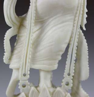 FINELY CARVED OX BONE FIGURAL WITH WOOD STAND  