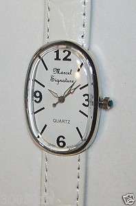   DRUCKER OVAL QUARTZ WATCH WITH WHITE LEATHER BAND, 5.25   6.50LONG