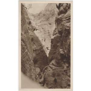  Reprint View of a deep crevasse in between cliff walls 