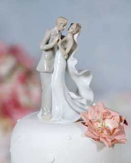 this elegant fine porcelain couple is hand painted and features a 