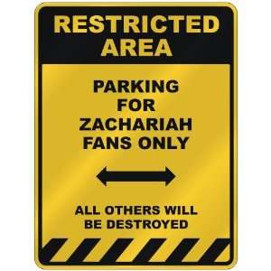 RESTRICTED AREA  PARKING FOR ZACHARIAH FANS ONLY  PARKING SIGN NAME