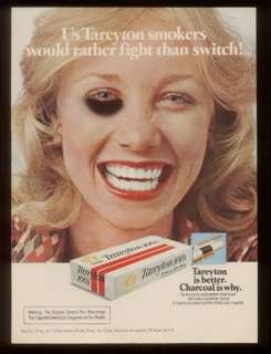 1975 black eye woman photo Tareyton cigarette ad  