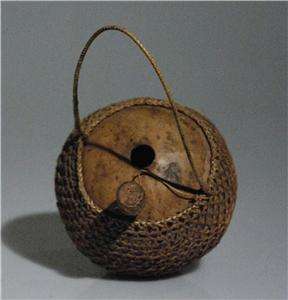 OLD PACIFIC OIL GOURD WITH INTRICATE WOVEN RATTAN COVER, HANDLE AND 