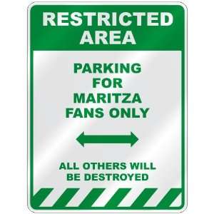   PARKING FOR MARITZA FANS ONLY  PARKING SIGN
