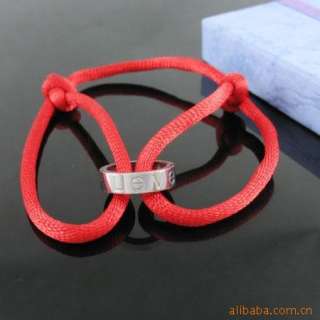 Love red string bracelet, a symbol of good luck  