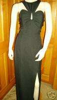 Elegant sophisticated long black formal dress gown with rhinestone pin 