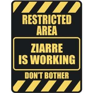   RESTRICTED AREA ZIARRE IS WORKING  PARKING SIGN