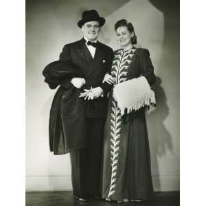 Young Couple Wearing Formal Dress Standing in Studio Photographic 