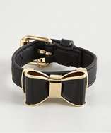 Stella McCartney black faux leather and enamel bow detail cuff style 